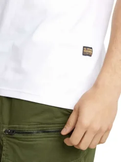 T-shirt en coton blanc uni avec une coupe droite et nom iconique