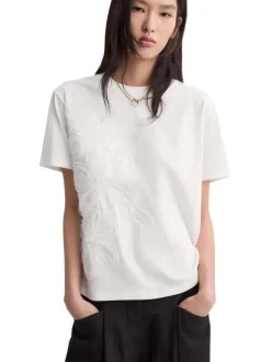 T-shirt en coton blanc uni avec une coupe droite et un col rond