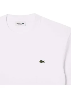 T-shirt en coton blanc uni avec une coupe droite et un col rond