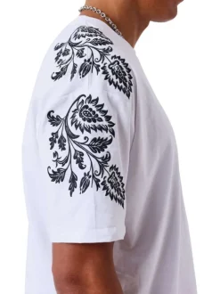 T-shirt en coton blanc uni avec une coupe droite et un col rond