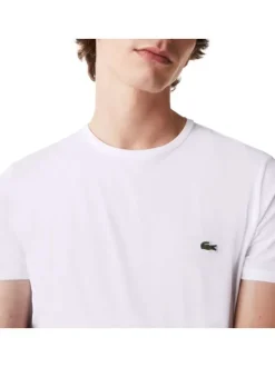 T-shirt en coton blanc uni avec une coupe droite et un col rond