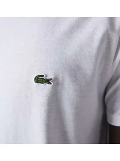 T-shirt en coton blanc uni avec une coupe droite et un col rond
