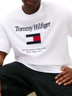 T-shirt en coton blanc uni avec une coupe droite et un grand logo
