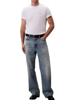 T-shirt en coton blanc uni avec un petit patch brodé et à col rond