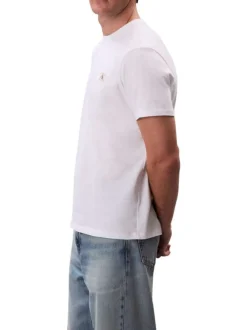 T-shirt en coton blanc uni avec un petit patch brodé et à col rond