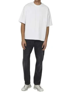 T-shirt en coton blanc uni épais avec une coupe très oversize et un col rond