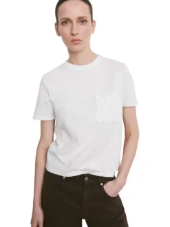 T-shirt en coton blanc uni pourvu d'un col rond et d'une coupe droite