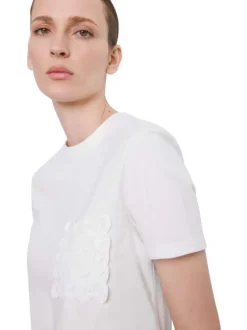 T-shirt en coton blanc uni pourvu d'un col rond et d'une coupe droite