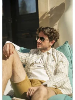 T-shirt en coton blanc uni pourvu d'une coupe droite et d'un col rond