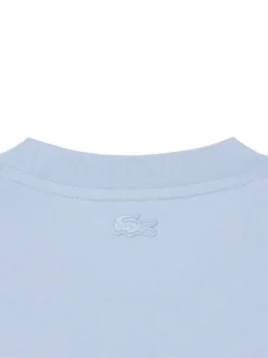 T-shirt en coton bleu à coupe droite pourvu d'un col rond texturé