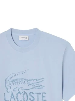 T-shirt en coton bleu à coupe droite pourvu d'un col rond texturé