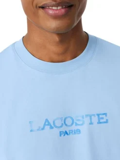 T-shirt en coton bleu à coupe droite pourvu d'un col rond texturé