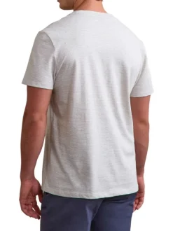 T-shirt en coton bleu et écru à rayures avec une coupe droite et un col rond