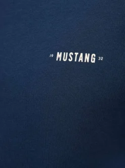 T-shirt en coton bleu à imprimé avec une coupe droite et un col rond