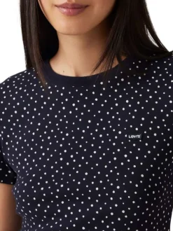 T-shirt en coton bleu marine à pois avec une coupe près du corps et un col rond