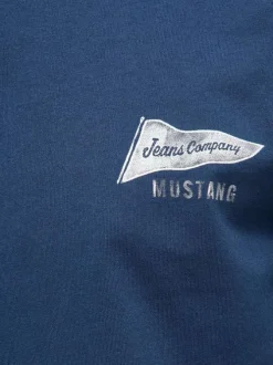 T-shirt en coton bleu uni avec une coupe droite et un col rond