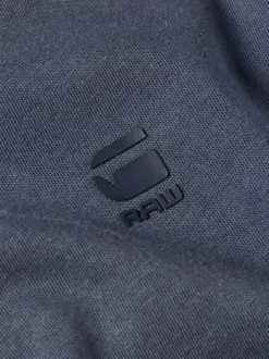 T-shirt en coton bleu uni avec une coupe droite et un col rond