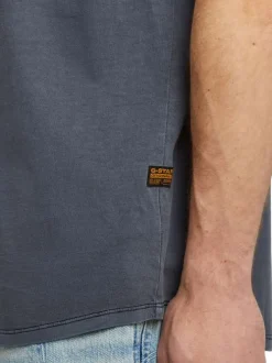 T-shirt en coton bleu uni avec une coupe droite et un col rond