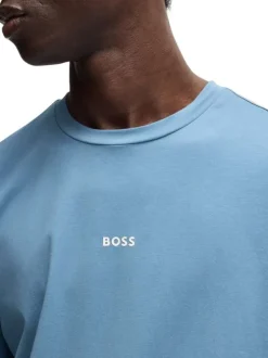 T-shirt en coton bleu uni à col rond avec le nom de la marque imprimé en petit