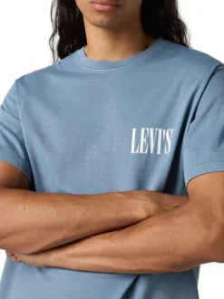 T-shirt en coton bleu uni à coupe oversize avec le nom de la marque imprimé