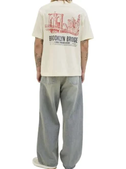 T-shirt en coton écru avec un imprimé une coupe droite et un col rond