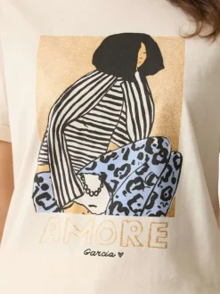 T-shirt en coton écru avec un personnage imprimé et une coupe droite