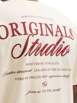T-shirt en coton écru imprimé à coupe droite pourvu d'un col rond
