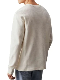 T-shirt en coton écru uni avec un col rond et des manches longues