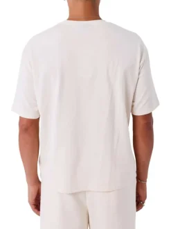 T-shirt en coton écru uni avec un col rond et à manches courtes