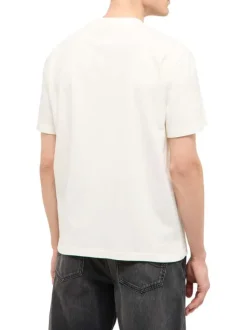 T-shirt en coton écru uni avec une coupe droite et un col rond