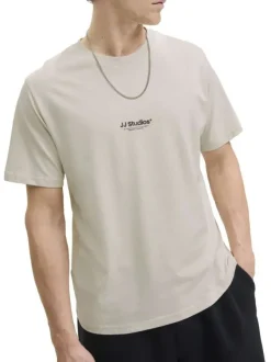 T-shirt en coton écru uni avec une coupe droite et un col rond