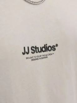 T-shirt en coton écru uni avec une coupe droite et un col rond