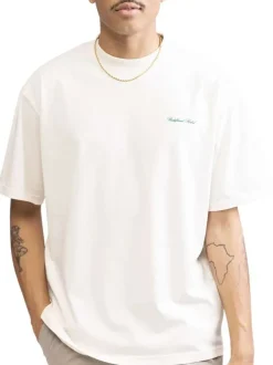 T-shirt en coton écru uni avec une coupe droite et un col rond