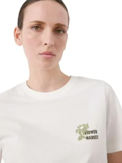 T-shirt en coton écru uni pourvu d'un col rond et d'une coupe droite