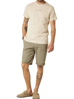 T-shirt en coton écru uni pourvu d'une coupe droite et d'un col rond