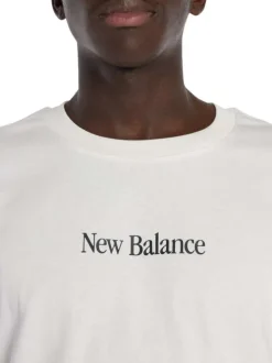 T-shirt en coton écru uni pourvu d'une coupe droite et d'un col rond