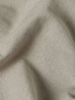 T-shirt en coton gris uni avec une coupe droite et un patch d'authenticité
