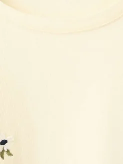 T-shirt en coton jaune uni avec une coupe droite et un col rond