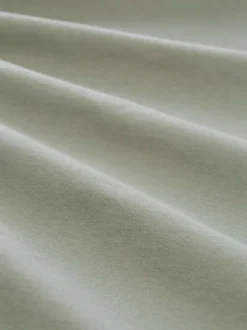 T-shirt en coton kaki avec un imprimé de la marque et une coupe droite