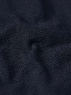 T-shirt en coton marine uni avec une coupe droite et nom iconique