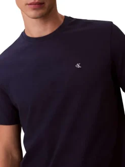 T-shirt en coton marine uni avec une coupe droite et un col rond