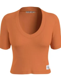 T-shirt en coton mélangé brique uni avec une coupe cropped et un col v