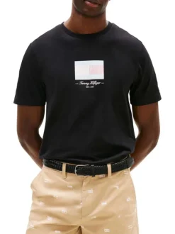 T-shirt en coton noir fantaisie avec un col rond et des manches courtes