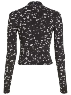 T-shirt en coton noir fleuri avec une coupe près du corps et un col montant