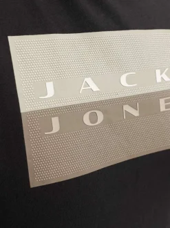 T-shirt en coton noir imprimé avec une coupe droite et un col rond