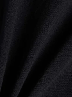 T-shirt en coton noir à imprimé avec une coupe droite et un col rond