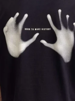 T-shirt en coton noir imprimé avec une coupe droite et un col rond