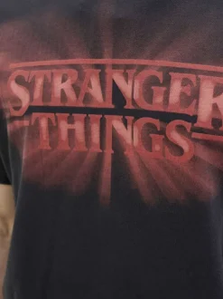 T-shirt en coton noir imprimé série à la poitrine et au dos avec un col rond