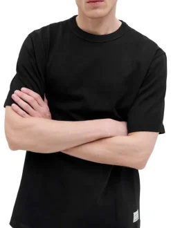 T-shirt en coton noir pourvu d'une coupe droite et d'un col rond
