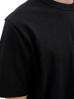 T-shirt en coton noir pourvu d'une coupe droite et d'un col rond